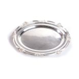 AN ELECTROPLATED TRAY oval with moulded reeded rim with scalloped corners, 45cm wide