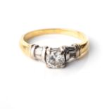 A DIAMOND RING Claw-set to the centre with a round brilliant-cut diamond weighing approximately 0,