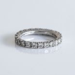 A BROWNS DIAMOND ETERNITY RING Claw-set with 23 round, brilliant-cut diamonds, colour D-E-F, clarity