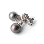 A PAIR OF DIAMOND AND SOUTH SEA PEARL EARRINGS Designed as a pair of drops with 72 round brilliant-