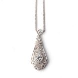 A DIAMOND PENDANT Bezel-set to the centre with a round brilliant-cut diamond weighing