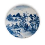 A PAIR OF BLUE AND WHITE ORIENTAL TILES Hand painted with hunting scenesEach 40cm diameter (2)