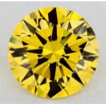 A 1.03 CARAT FANCY VIVID YELLOW DIAMOND The round brilliant-cut diamond accompanied by a GIA