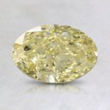 A 1.60 CARAT FANCY LIGHT YELLOW OVAL DIAMOND The oval-cut diamond accompanied by a GIA certificate