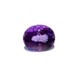 A 12.39CT AMETHYST A faceted oval amethyst