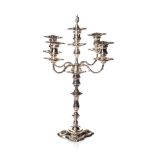 A SILVER CANDELABRUM, WILLIAM HUTTON & SONS, SHEFFIELD, 1886 The tapering stem with a knotted fluted