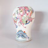 A CHINESE FAMILLE ROSE VASE, QING DYNASTY, EARLY 19TH CENTURY The baluster body painted with figures