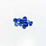 A PARCEL OF 12 TANZANITES oval, assorted sizes