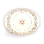 A TRIUMPH LIMOGES 'EMPRESS' PATTERN CAKE PLATTER Oval with floral centre, 22ct gold rim, diameter