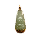 A JADE PENDANT Carved in the form of a Buddha seated on a lotus leaf, with 18K gold mount