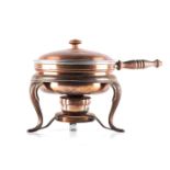 A COPPER AND BRASS CHAFING DISH With lid on brass stand and wooden handle