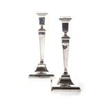 A PAIR OF SILVER CANDLESTICKS, MAKER'S MARK R.M.E.H, BIRMINGHAM, 20TH CENTURY Each square-section