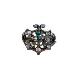 A BROOCH with openwork panel bezel-set with crystals and created emerald in a crown-style design