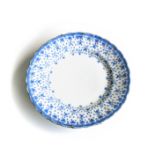 A SCHALLER BAVARIA 'BLAUE LILIE' PATTERN PLATE Blue and white, floral design, scalloped rim, back