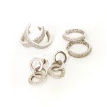 A THREE PAIRS OF STERLING SILVER EARRINGS set with Swarovski style crystals, 2 pairs of hoops and