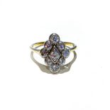 A DIAMOND RING pave set as a marquise cluster design with nine diamonds with a combined weight of