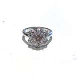 A DIAMOND RING claw set to the centre with a round brilliant cut diamond weighing approximately 0,55