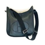 HERMES “EVELYNE” LE CUIR HANDBAG 32 by 34 by 7cm Black leather with suede interior and canvas