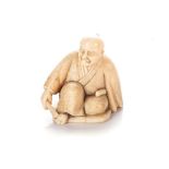 A JAPANESE IVORY NETSUKE OF A SCHOLAR, MEIJI PERIOD, 1868 - 1912 NOT SUITABLE FOR EXPORTSeated,