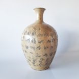 A CHINESE ‘DRAGON BALL’ WATER VESSEL, MID 20TH CENTURY The ovoid body rising to a flaring neck,