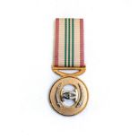 AN RSA INTELLIGENCE SERVICES GOLD MEDAL Full size, complete with ribbon, COA on reverse.