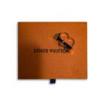 A LADY'S LOUIS VUITTON RING A lady's crystal two-tone metal, double knuckle ring, authentication