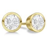 A PAIR OF DIAMOND EARRINGS bezel set to the centre with two round brilliant cut diamonds weighing