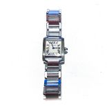 A LADY'S CARTIER WRISTWATCH reference no 2384, the square white 18mm dial with Roman numerals on a