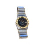 A GENTLEMAN'S WRISTWATCH, OMEGA CONSTELLATION Reference no. 1448.5/31, the 28mm circular black