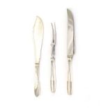A SILVER PLATED CARVING KNIFE AND FORK And a fish slice, the fish slice 29cm long (3)