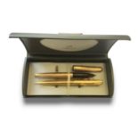 A MISMATCHED PARKER FOUNTAIN PEN AND PENCIL 10ct gold plated accompanied by a box