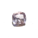 A 26.7CT ROSE QUARTZ A faceted cushion-cut rose quartz