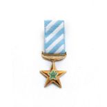 A MINIATURE AD ASTRA DECORATION Hallmarked 925, complete with ribbon