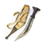 NGOMBE SWORD, ZAIRE Complete with animal hide scabbard, wooden handle with metal cap