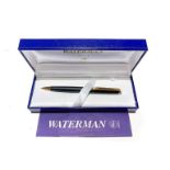 A WATERMAN PENCIL Black housing with gold top, accompanied by box and papers