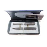 A PARKER PEN AND PENCIL SET Stainless-steel, accompanied by box and papers