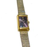 A UNISEX OMEGA WATCH The rectangular black dial 22m long with baton hour markers on gold mesh