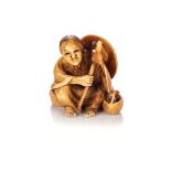 A JAPANESE IVORY NETSUKE OF ONO NO KOMACHI, TAISHO PERIOD, 1912 - 1926 NOT SUITABLE FOR EXPORTThe