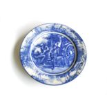 A ROYAL DOULTON 'JOCK OF THE BUSHVELD' PLATE Blue and white, depicting Jock and his owner centre,