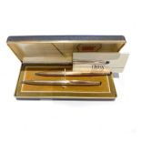 A CROSS PEN AND PENCIL SET 10ct gold filled accompanied by box and papers