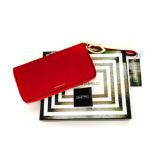 A LULU GUINNESS CLUTCH WALLET Pillar box red crosshatched leather travel wallet with matching