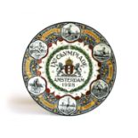 A SOCIETE CERAMIQUE MAASTRICHT HOLLAND 1928 OLYMPIC PLATE Depicting the variety of games at