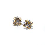 A PAIR OF DIAMOND EARRINGS floral design claw set with a five round brilliant cut diamonds in 14ct