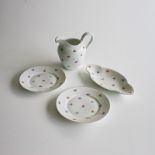 A ROSENTHAL MILK JUG AND SWEET PLATTER Of floral design, together with two plates (4)