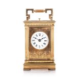 A BRASS CARRIAGE CLOCK, CHARLES FRODSHAM, LONDON The rectangular white dial with Roman numeral
