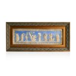 A WEDGWOOD STYLE FRAMED PLAQUE 26cm high, 57cm long (including frame) distress