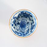 A CHINESE BLUE AND WHITE TEA BOWL, QING DYNASTY, QIANLONG, 1735 – 1796 The interior painted with a