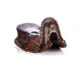 A TIBETAN HORSE SADDLE, GSER SGA, 19TH CENTURY The domed wooden pommel centred by a circular