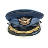 A RHODESIAN AIR FORCE SENIOR OFFICER PEAK CAP Group Captain's peak cap, 1970 to 1980. Size 56, maker