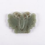 A CHINESE CELADON JADE BUTTERFLY PENDANT, LATE 19TH/EARLY 20TH CENTURY The segmented wings carved